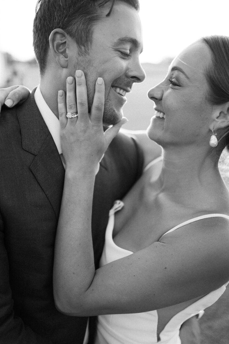 Beautiful couple sharing a joyful moment on their wedding day.