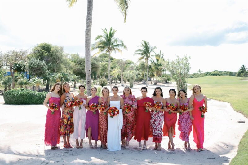 Babbie & Jamie wedding: vibrant bridesmaids and flower girls in colorful dresses.