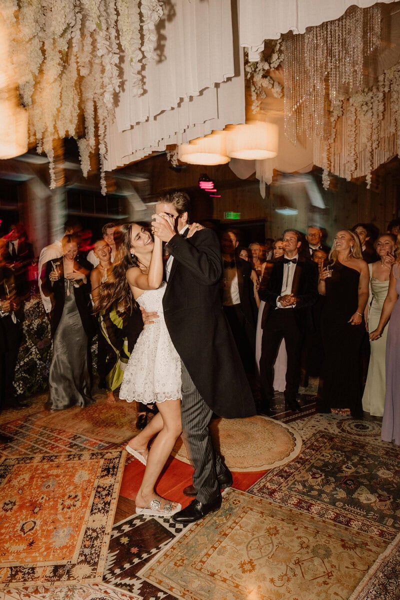 Wedding couple sharing a dance at their celebration.