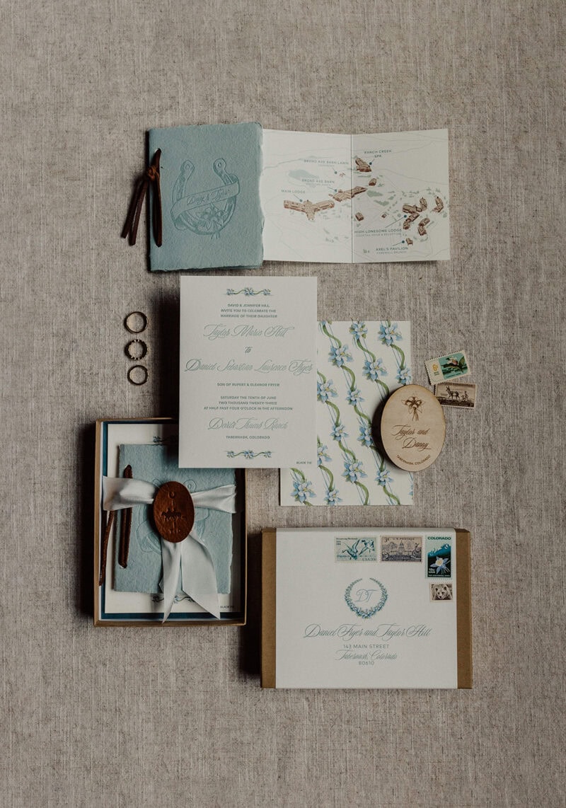 Nautical wedding invitation suite with soft blue tones and elegant details.